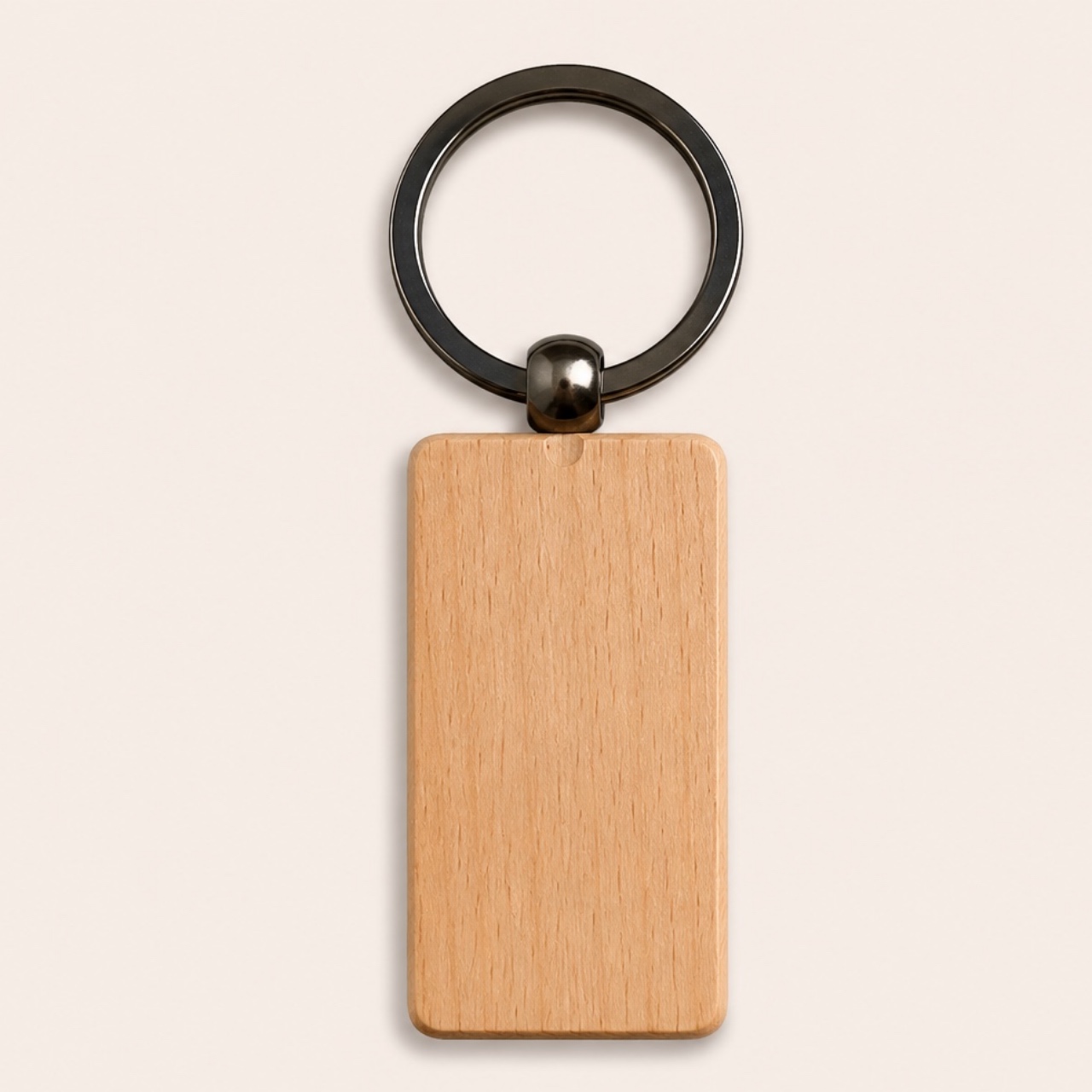 Blank classic wooden key ring — a clean oblong beech tag on a gunmetal split ring, ready to be engraved with your own logo
